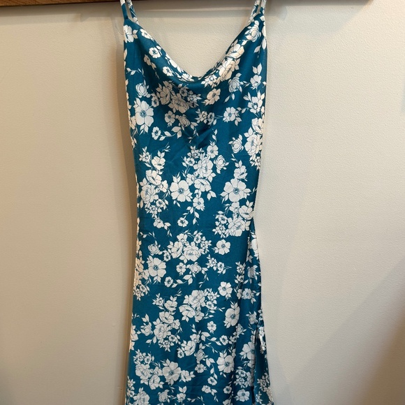 Blue and white floral silky material midi dress with side slit in small. - Picture 1 of 2